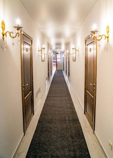 Фото номера Номер в мансарде Отель Villa Livorno г. Буковель 3