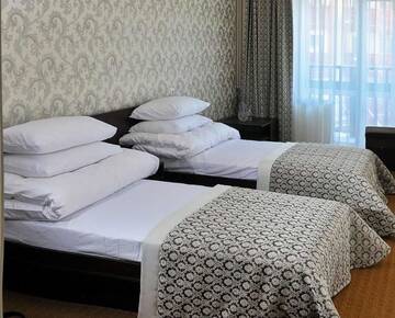 Фото номера Стандартный двухместный номер с 2 отдельными кроватями Отель Rooms in Kasimir resort hotel г. Буковель 10