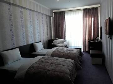 Фото номера Стандартный двухместный номер с 2 отдельными кроватями Отель Rooms in Kasimir resort hotel г. Буковель 27