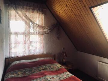 Фото номера Стандартный четырехместный номер Гостевой дом Ra г. Буковель 4