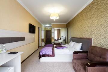 Фото номера Люкс с 2 спальнями Отель Kasimir Hotel Rooms г. Буковель 2