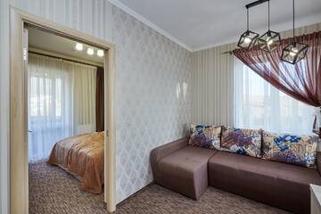 Фото номера Улучшенные апартаменты Отель Kasimir Hotel Rooms г. Буковель 4