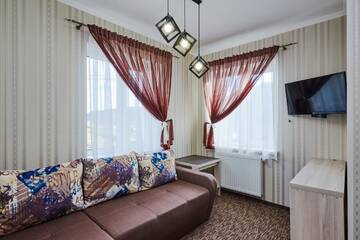 Фото номера Улучшенные апартаменты Отель Kasimir Hotel Rooms г. Буковель 2