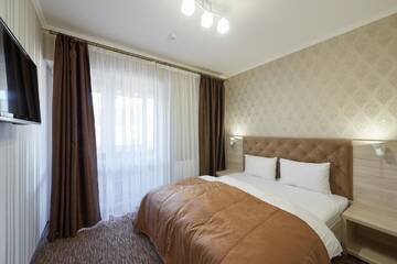 Фото номера Улучшенные апартаменты Отель Kasimir Hotel Rooms г. Буковель 3