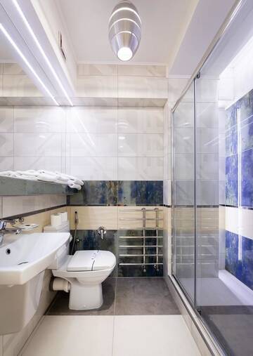 Фото номера Трехместный номер с балконом Отель Kasimir Hotel Rooms г. Буковель 6