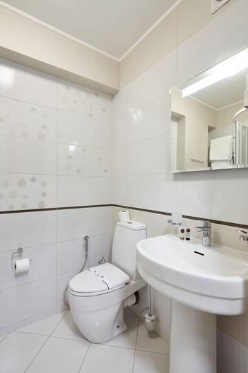 Фото номера Трехместный номер с балконом Отель Kasimir Hotel Rooms г. Буковель 9