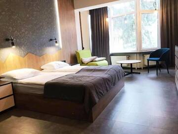 Фото номера Стандартный трехместный номер Отель BLUE mountain г. Буковель 2