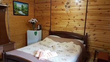 Фото номера Улучшенный трехместный номер Гостевой дом Sadyba u Halyny Sunrise г. Буковель 10