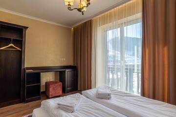 Фото номера Люкс Курортные отели Amarena SPA Hotel г. Буковель 2