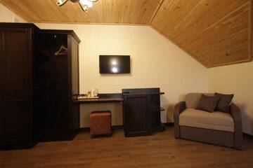 Фото номера Трехместный номер Делюкс Курортные отели Amarena SPA Hotel г. Буковель 3