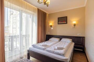 Фото номера Люкс Курортные отели Amarena SPA Hotel г. Буковель 3