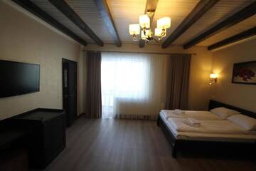 Фото номера Дом с 4 спальнями Курортные отели Amarena SPA Hotel г. Буковель 3