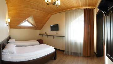 Фото номера Трехместный номер Курортные отели Amarena SPA Hotel г. Буковель 3