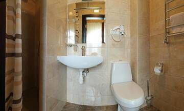Фото номера Трехместный номер Курортные отели Amarena SPA Hotel г. Буковель 6