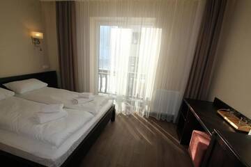 Фото номера Люкс Курортные отели Amarena SPA Hotel г. Буковель 21