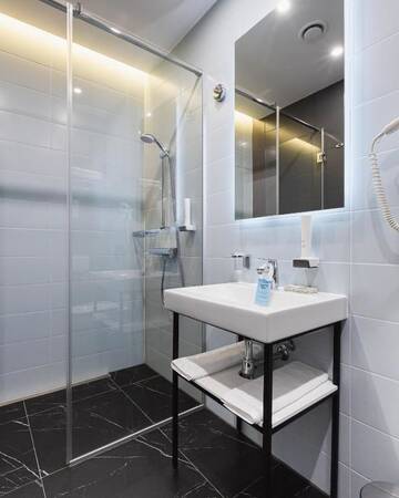 Фото номера Апартаменты с 2 спальнями Апарт-отели Beskyd Suites г. Буковель 21