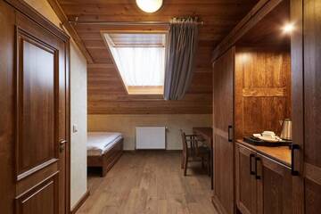 Фото номера Одноместный номер - Мансарда Отель Ганц &amp; Spa г. Буковель 2