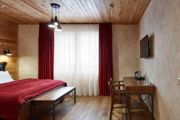 Фото номера Семейный люкс Отель Ганц &amp; Spa г. Буковель 10