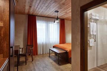 Фото номера Улучшенный двухместный номер с 1 кроватью Отель Ганц &amp; Spa г. Буковель 23