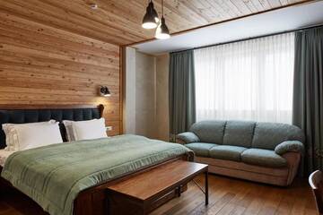 Фото номера Двухместный номер Делюкс с 1 кроватью Отель Ганц &amp; Spa г. Буковель 2