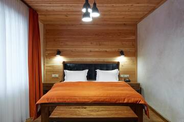 Фото номера Улучшенный двухместный номер с 1 кроватью Отель Ганц &amp; Spa г. Буковель 8