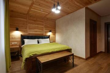 Фото номера Улучшенный двухместный номер с 1 кроватью Отель Ганц &amp; Spa г. Буковель 6