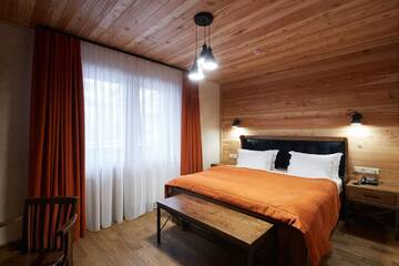 Фото номера Улучшенный двухместный номер с 1 кроватью Отель Ганц &amp; Spa г. Буковель 9
