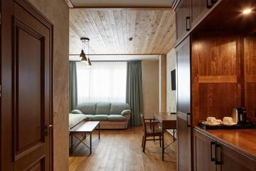 Фото номера Двухместный номер Делюкс с 1 кроватью Отель Ганц &amp; Spa г. Буковель 5
