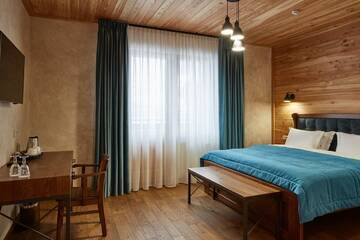 Фото номера Семейный люкс Отель Ганц &amp; Spa г. Буковель 4