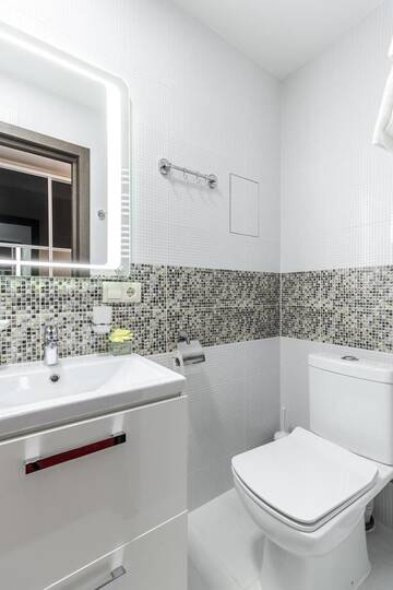 Фото номера Четырехместный номер с балконом Отель Villa Gor Apartments г. Буковель 11