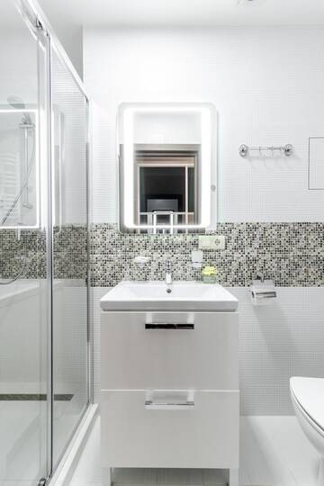 Фото номера Четырехместный номер с балконом Отель Villa Gor Apartments г. Буковель 12