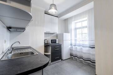 Фото номера Четырехместный номер с балконом Отель Villa Gor Apartments г. Буковель 5