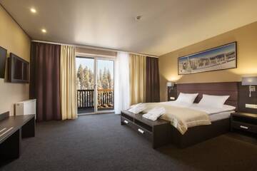 Фото номера Люкс с видом на горы, доступ в спа-центр Отель Girski Hotel&amp;Spa г. Буковель 2