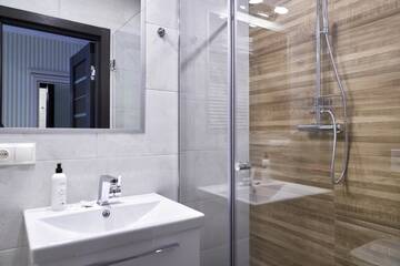 Фото номера Апартаменты с 2 спальнями Апарт-отели Villa Gor Aparts г. Буковель 11