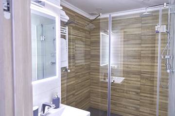 Фото номера Апартаменты с 2 спальнями Апарт-отели Villa Gor Aparts г. Буковель 28