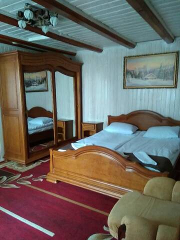Фото номера Люкс с балконом Отель Dovbushanka Hotel in Bukovel г. Буковель 4