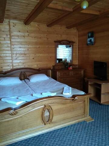 Фото номера Люкс с балконом Отель Dovbushanka Hotel in Bukovel г. Буковель 9
