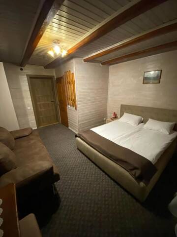 Фото номера Полулюкс с балконом Отель Dovbushanka Hotel in Bukovel г. Буковель 19