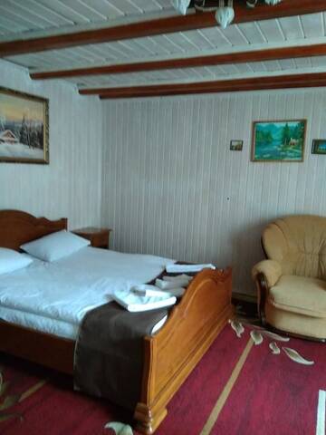 Фото номера Люкс с балконом Отель Dovbushanka Hotel in Bukovel г. Буковель 3